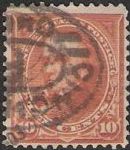 Orange 10-cent U.S. postage stamp picturing Daniel Webster