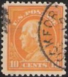 Yellow 10-cent U.S. postage stamp picturing Benjamin Franklin
