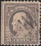 Gray 15-cent U.S. postage stamp picturing Benjamin Franklin