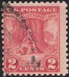 Red 2-cent U.S. postage stamp picturing George Washington kneeling in prayer at Valley Forge