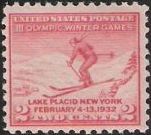 Red 2-cent U.S. postage stamp picturing skier