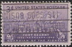 Purple 3-cent U.S. postage stamp picturing settlers with covered wagon and Fort Kearny