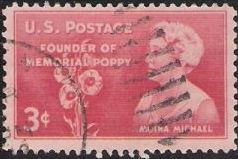 Pink 3-cent U.S. postage stamp picturing Moina Michael and poppies