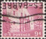 Pink 9-cent U.S. postage stamp picturing the Alamo
