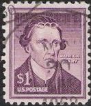 Purple $1- U.S. postage stamp picturing Patrick Henry