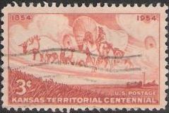 Brown orange 3-cent U.S. postage stamp picturing wagon train and field