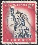Red and violet blue 11-cent U.S. postage stamp picturing Statue of Liberty