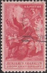 Red 3-cent U.S. postage stamp picturing Benjamin Franklin