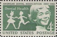 Green 4-cent U.S. postage stamp picturing children
