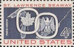Blue and red 4-cent U.S. postage stamp picturing maple leaf and eagle