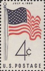 Blue and red 4-cent U.S. postage stamp picturing American flag