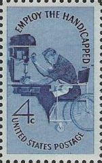 Blue 4-cent U.S. postage stamp picturing man in wheelchair using machine