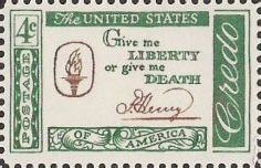 Green and brown 4-cent U.S. postage stamp bearing quote, 'Give me liberty or give me death'