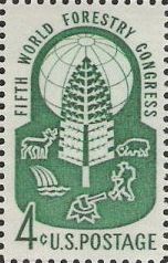 Green 4-cent U.S. postage stamp picturing globe and tree