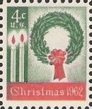 Green and red 4-cent U.S. postage stamp picturing wreath