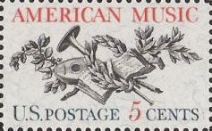 Red and black 5-cent U.S. postage stamp picturing musical instruments