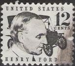 Black 12-cent U.S. postage stamp picturing Henry Ford and car