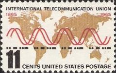 11-cent U.S. postage stamp picturing world map, radio waves, and Morse code