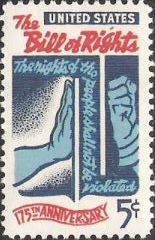 Blue and red 5-cent U.S. postage stamp picturing wall between hands