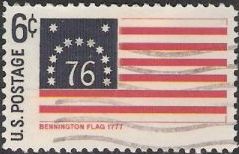 Blue and red 6-cent U.S. postage stamp picturing Bennington flag