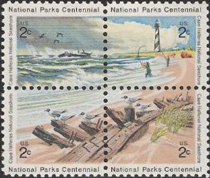 Block of four 2-cent U.S. postage stamps picturing beach scene from Cape Hatteras National Seashore