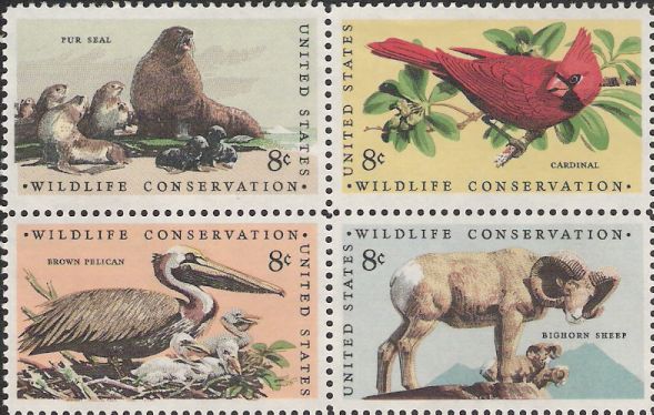 Block of four 8-cent U.S. postage stamps picturing fur seal, cardinal, brown pelican, and bighorn sheep