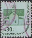 Green and blue 30-cent U.S. postage stamp picturing schoolhouse