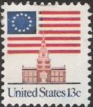 13-cent U.S. postage stamp picturing American flag and Independence Hall