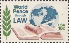 10-cent U.S. postage stamp picturing globe, gavel, and book