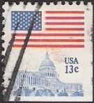 13-cent U.S. postage stamp picturing American flag and U.S. Capitol