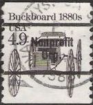 Brown black 4.9-cent U.S. postage stamp picturing buckboard