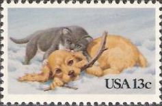 13-cent U.S. postage stamp picturing kitten and puppy