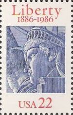 Blue & red 22-cent U.S. postage stamp picturing Statue of Liberty