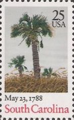 25-cent U.S. postage stamp picturing palm trees