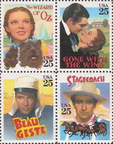 Block of four 25-cent U.S. postage stamps picturing characters from The Wizard of Oz, Gone With the Wind, Beau Geste, and Stagecoach