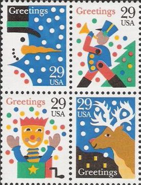 Block of four 29-cent U.S. postage stamps picturing snowman, toy soldier, jack in the box, and reindeer