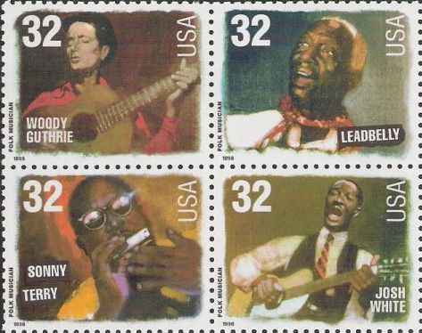 Block of four 32-cent U.S. postage stamps picturing Woody Guthrie, Leadbelly, Sonny Terry, and Josh White