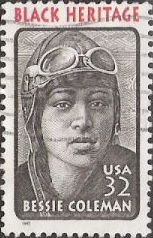 Black & red 32-cent U.S. postage stamp picturing Bessie Coleman