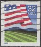 32-cent U.S. postage stamp picturing American flag over field