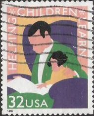32-cent U.S. postage stamp picturing man and child