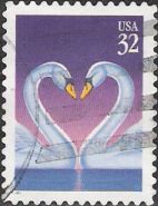 32-cent U.S. postage stamp picturing swans facing each other with necks curved in shape of heart