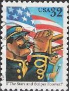 32-cent U.S. postage stamp picturing American flag and marching band members