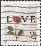 34-cent U.S. postage stamp picturing love letter and rose