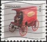 Non-denominated 37-cent U.S. postage stamp picturing toy mail wagon