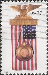 37-cent U.S. postage stamp pcituring presidential campaign badge and American flag