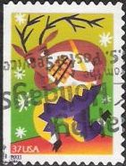 37-cent U.S. postage stamp picturing reindeer playing pan pipes