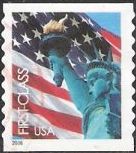 Non-denominated 39-cent U.S. postage stamp picturing American flag and Statue of Liberty
