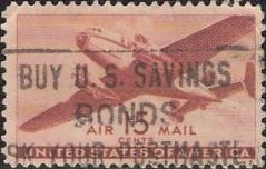 Brown 15-cent U.S. postage stamp picturing airplane