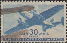 Blue 30-cent U.S. postage stamp picturing airplane