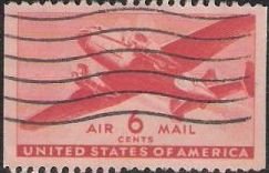 Red 6-cent U.S. postage stamp picturing airplane